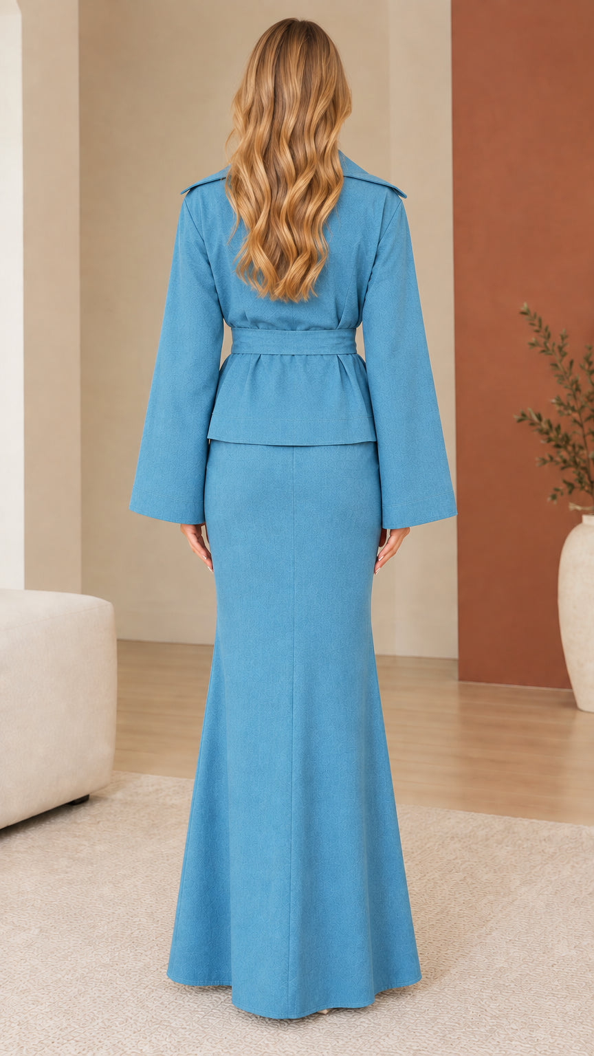 Back view of model wearing sky blue two-piece lapel jacket and maxi skirt
