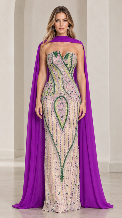 Front view of model wearing purple strapless beaded evening gown with matching purple chiffon cape