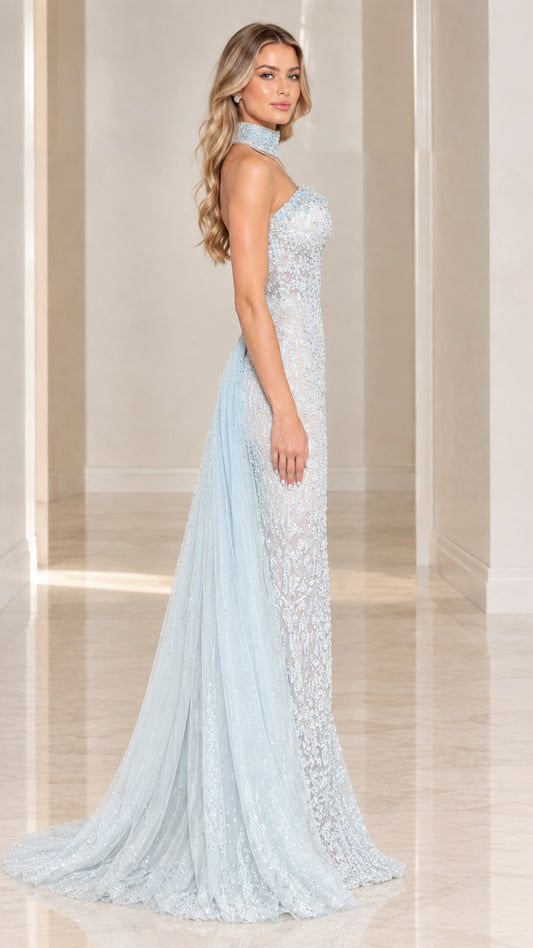 Side profile of model in Light Blue lace formal gown showing sweeping tulle train