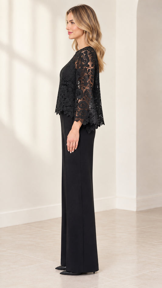 Side profile of black lace overlay evening jumpsuit with wide leg trousers