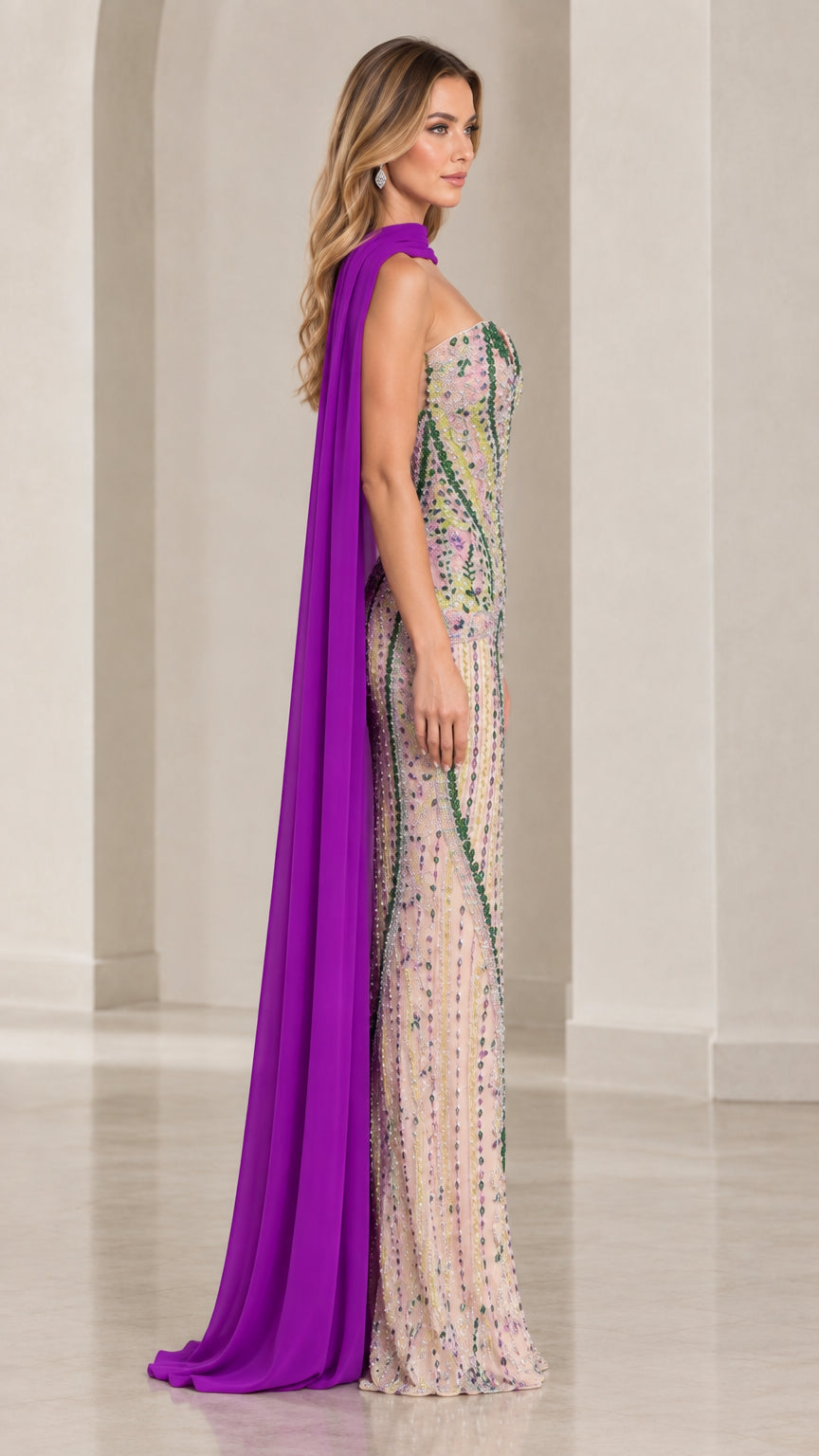 Side angle of model showcasing purple beaded column gown and back draped cape