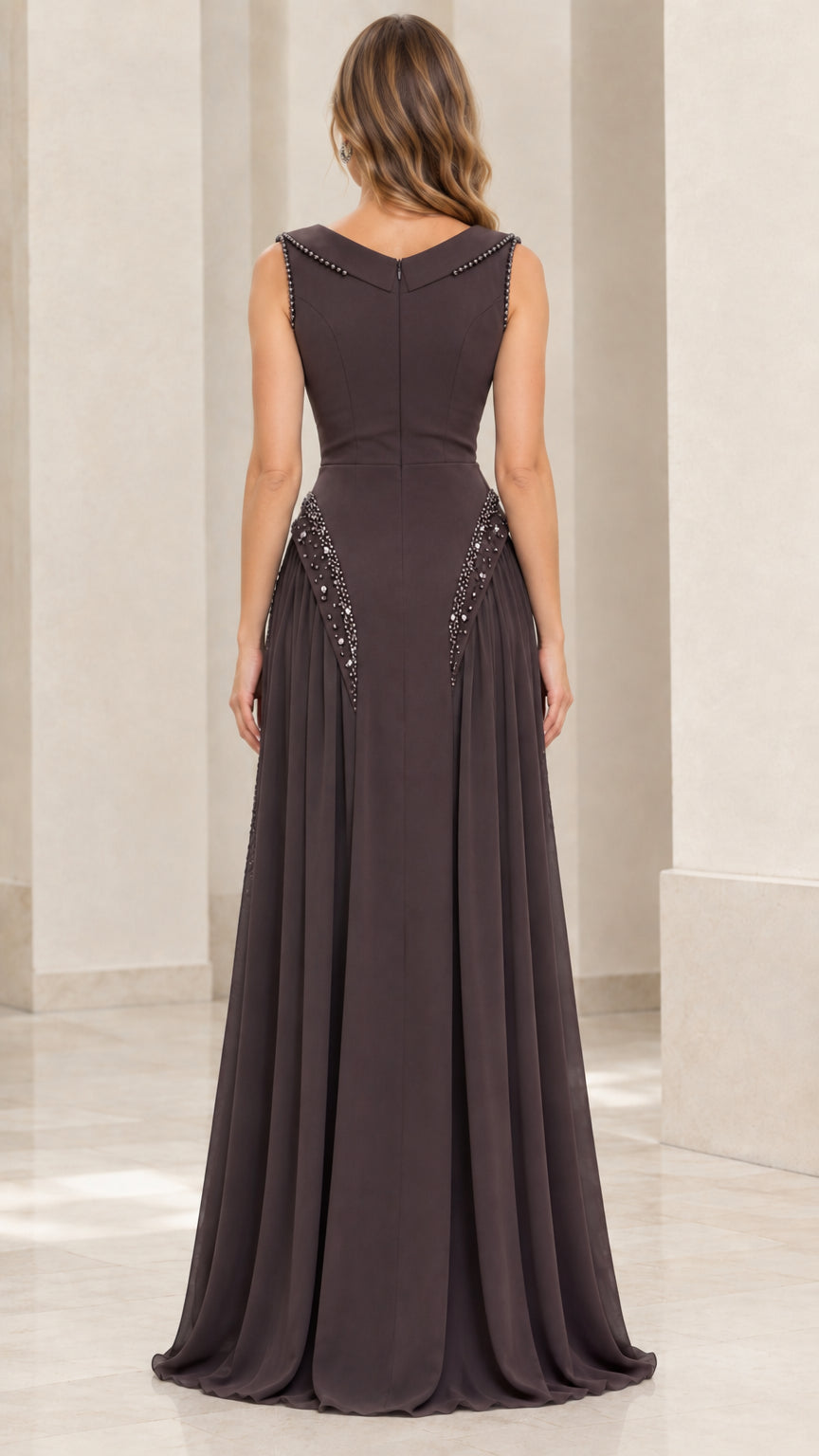 Back view of woman wearing espresso brown formal gown with beaded V-back