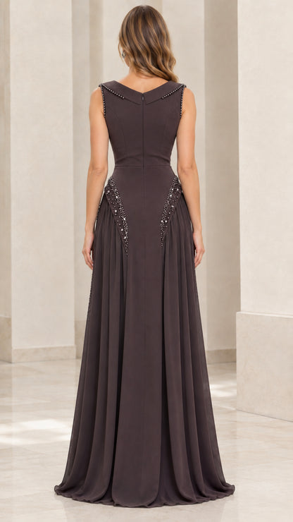 Back view of woman wearing espresso brown formal gown with beaded V-back