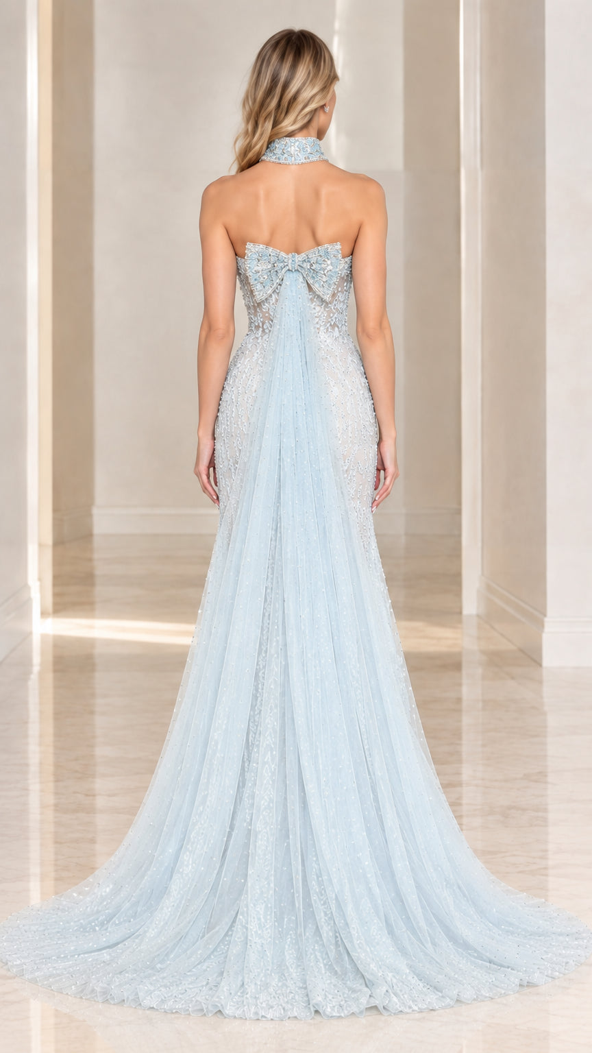 Back view of model wearing Light Blue evening gown featuring bow detail and train