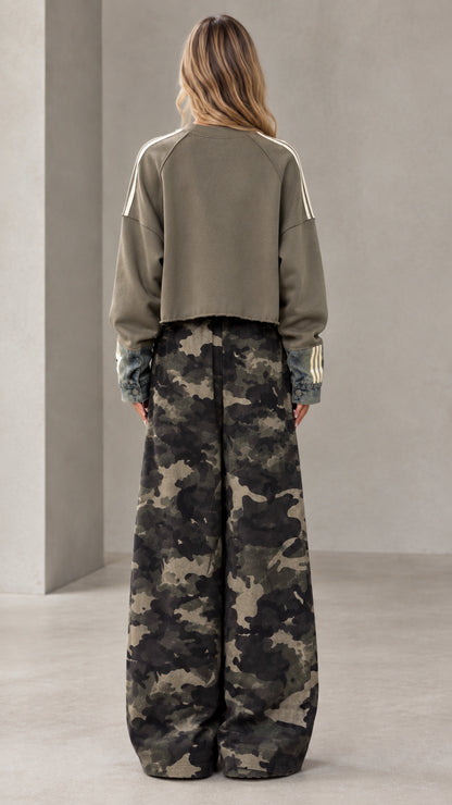 Back full-length view of olive green cropped sweatshirt and matching wide-leg camo pants