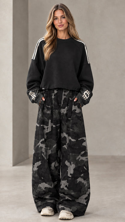 Black cropped sweatshirt and dark camo wide-leg pants two-piece set