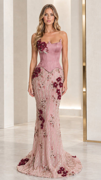 Full-length view of dusty pink strapless corset gown with floral details