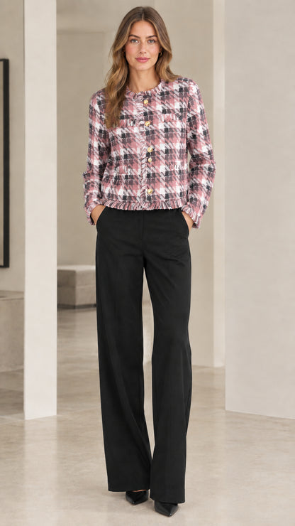 Model wearing pastel pink and white plaid tweed cropped jacket