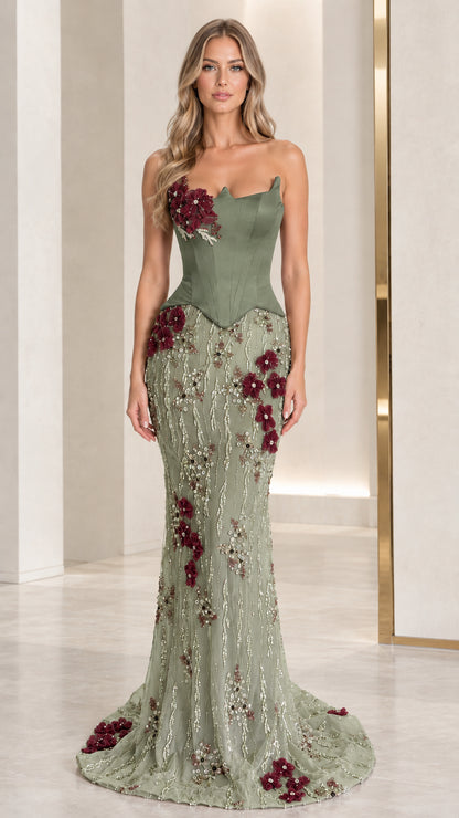 Full-length view of sage green strapless corset mermaid gown with burgundy floral accents