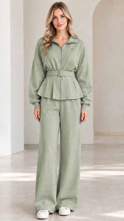 Front full-length view of sage green zip-up belted peplum jacket and wide-leg pants set